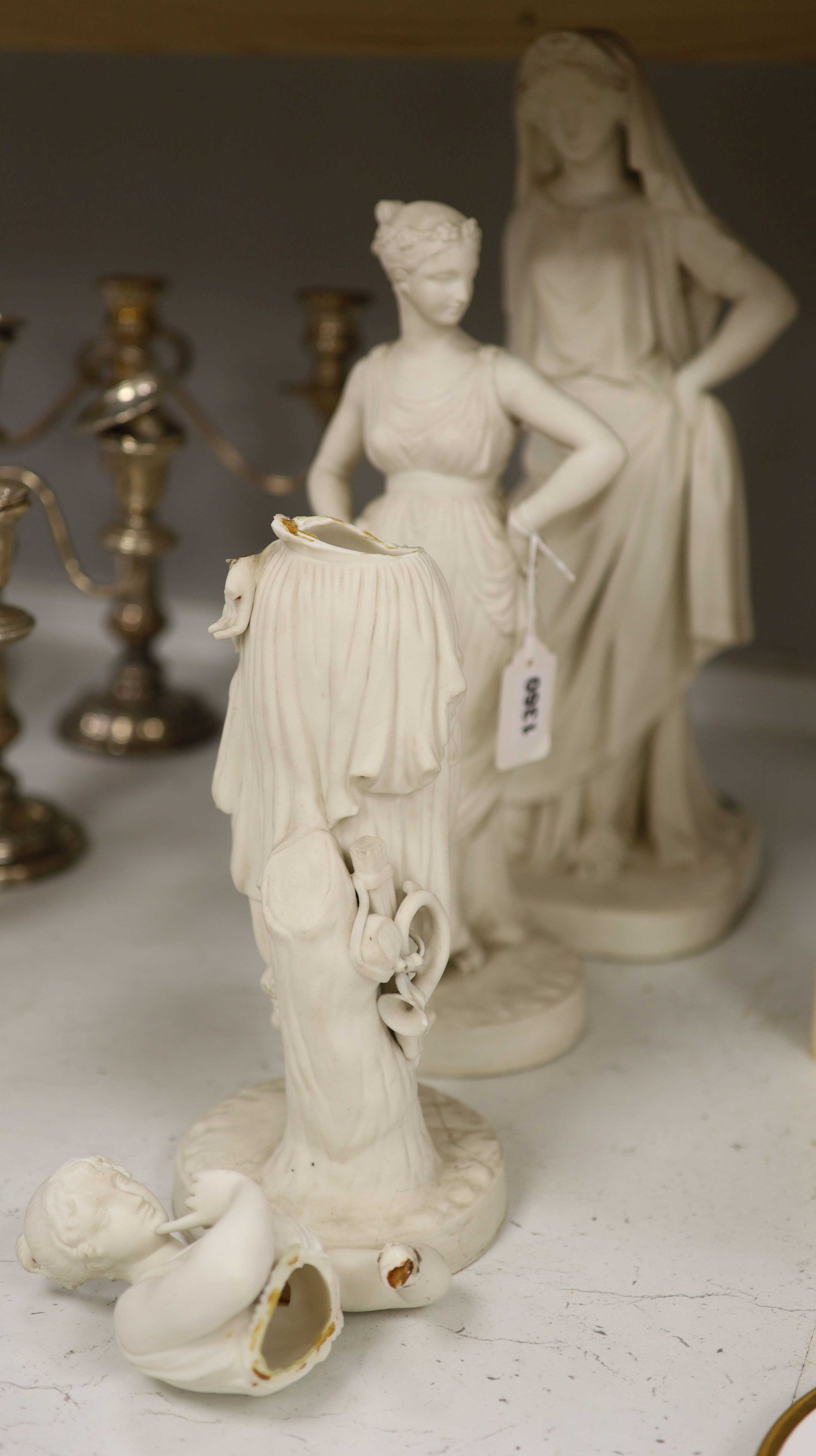 Two Minton parian figures of classical maidens and a similar Worcester figure, tallest 43cm (a.f.)